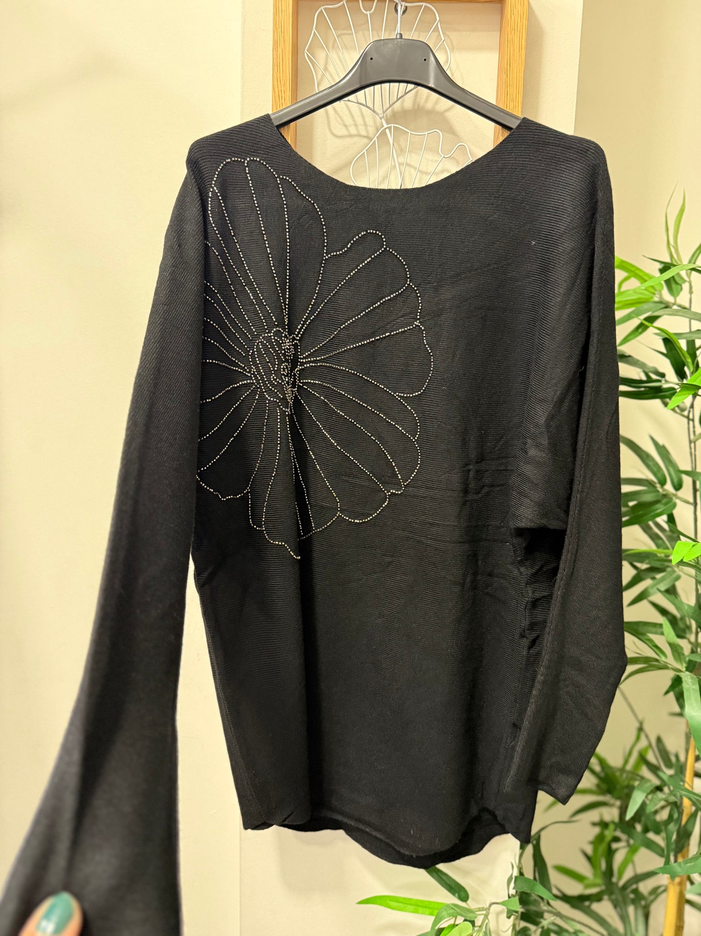Pull fleurs à strasse